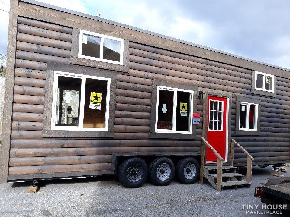 "Real Logs" Tiny House on New DOT Approved Tandem Trailer 8' x 32', Dual Lofts - Image 1 Thumbnail