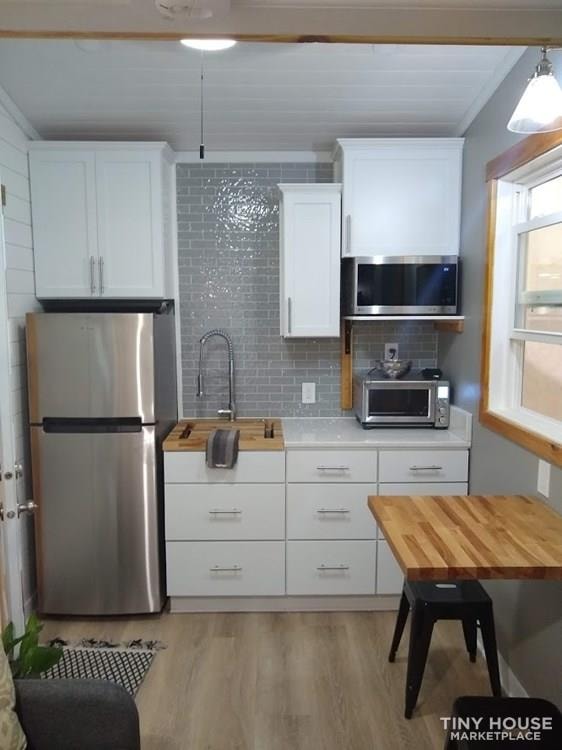 "The Endeavor" By Aspire Tiny Homes - Room for 6 to Relax and Sleep  - Image 1 Thumbnail