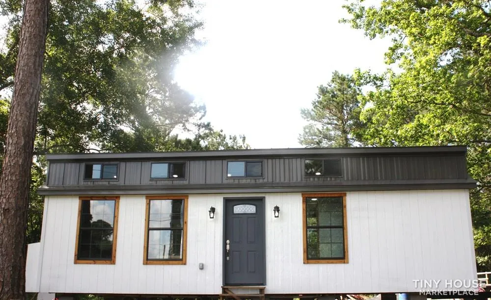 I live in a backyard 'tiny home on wheels' for $725/month—here's