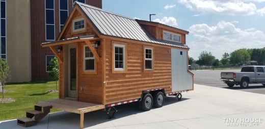 20' Tiny House with exterior storage compartments and fold down deck.