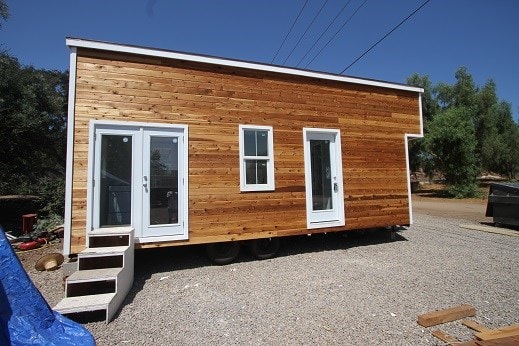 Modern Caravan Tiny House 9 x 24 378 sq ft Professionally built on trailer w/ dual loft make offer - Image 1 Thumbnail