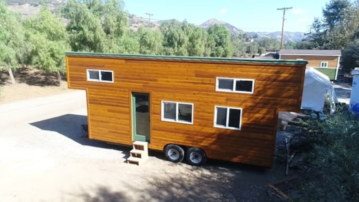 9 x 24 Modern Caravan by Tiny House Cottages professionally built dual lofts washer dryer full kitchen hardwoods composting toilet