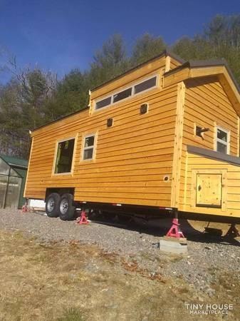 24ft x 8ft custom built rustic tiny home on wheels