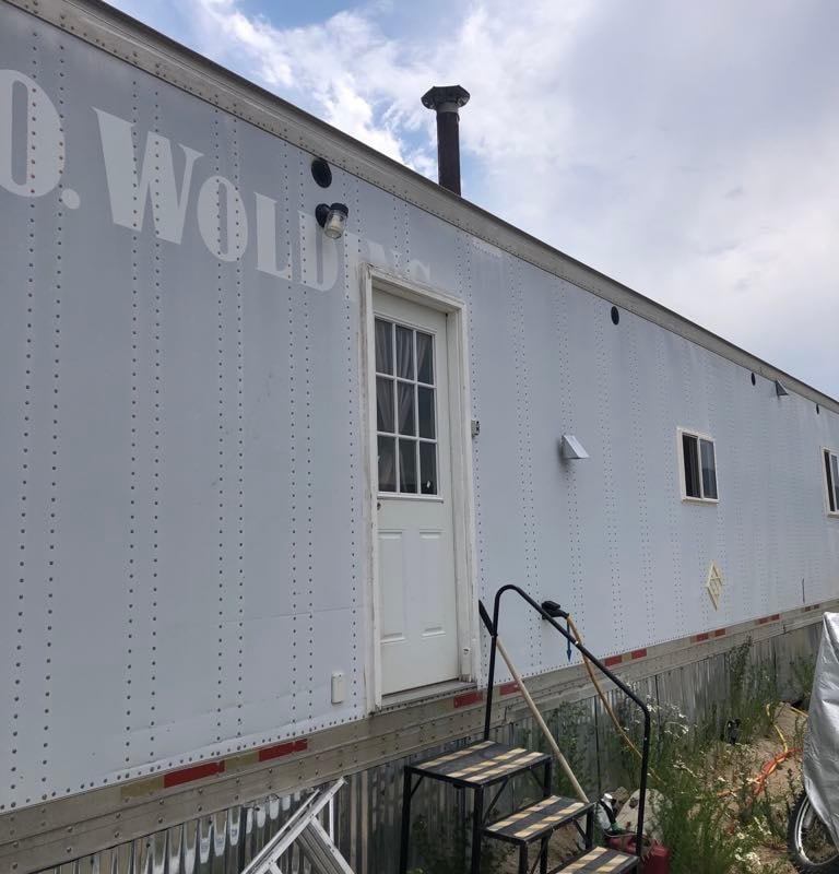 53'ft Converted Box Trailer Tiny Home 1Bed 1 Bath with Wood Stove, Travel Ready! - Image 1 Thumbnail