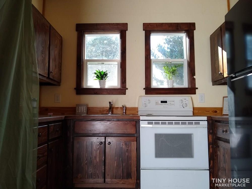 Beautiful, Open Tiny House with Full Bathroom, Kitchen, and Modern Conveniences - Slide 5