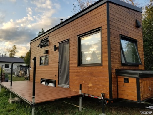 Cedar and poplar cabin on wheels