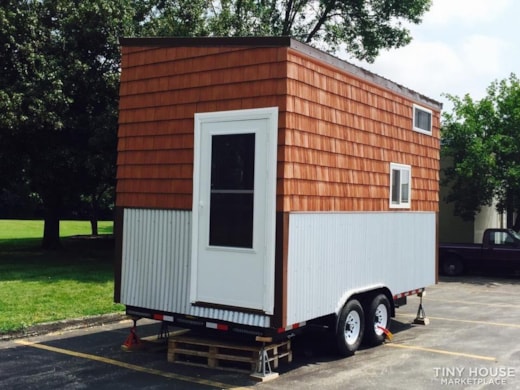 Cedar/Birch Tiny house on wheels loaded with packages