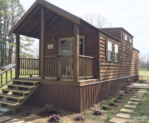 Cedar-sided park model tiny home stationed on one acre in rural West Tenn.