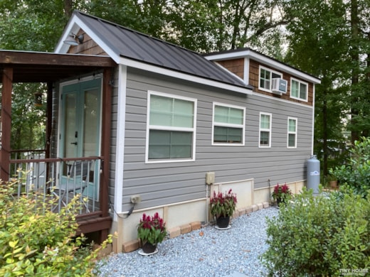 Charming tiny home on large wooded lot