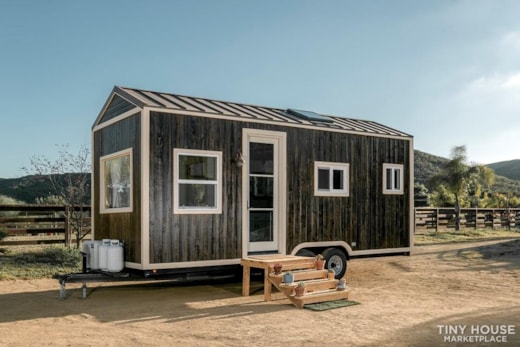 Gorgeous modern meets rustic tiny home on wheels!