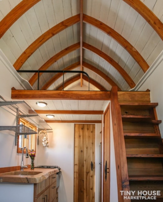 Handmade Tiny House with curved ceilings and beautiful wood details