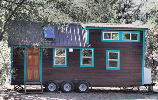 Live large in this custom tiny home.