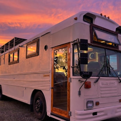 Off-Grid Luxury Skoolie | 20" Roof Raise | 2,700W Solar | Cummins Diesel - Image 2 Thumbnail
