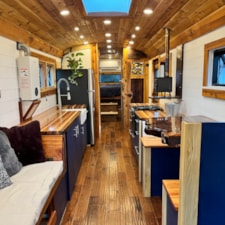 Off-Grid Luxury Skoolie | 20" Roof Raise | 2,700W Solar | Cummins Diesel - Image 3 Thumbnail