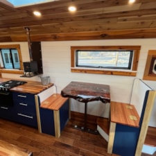 Off-Grid Luxury Skoolie | 20" Roof Raise | 2,700W Solar | Cummins Diesel - Image 4 Thumbnail