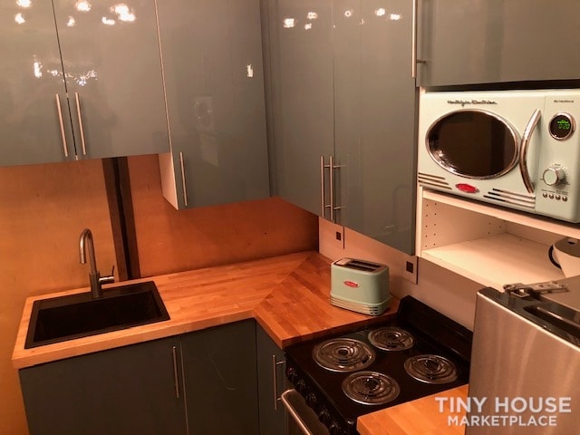 Shipping Container Tiny House Full Kitchen Full Bath Rooftop Deck - Slide 1